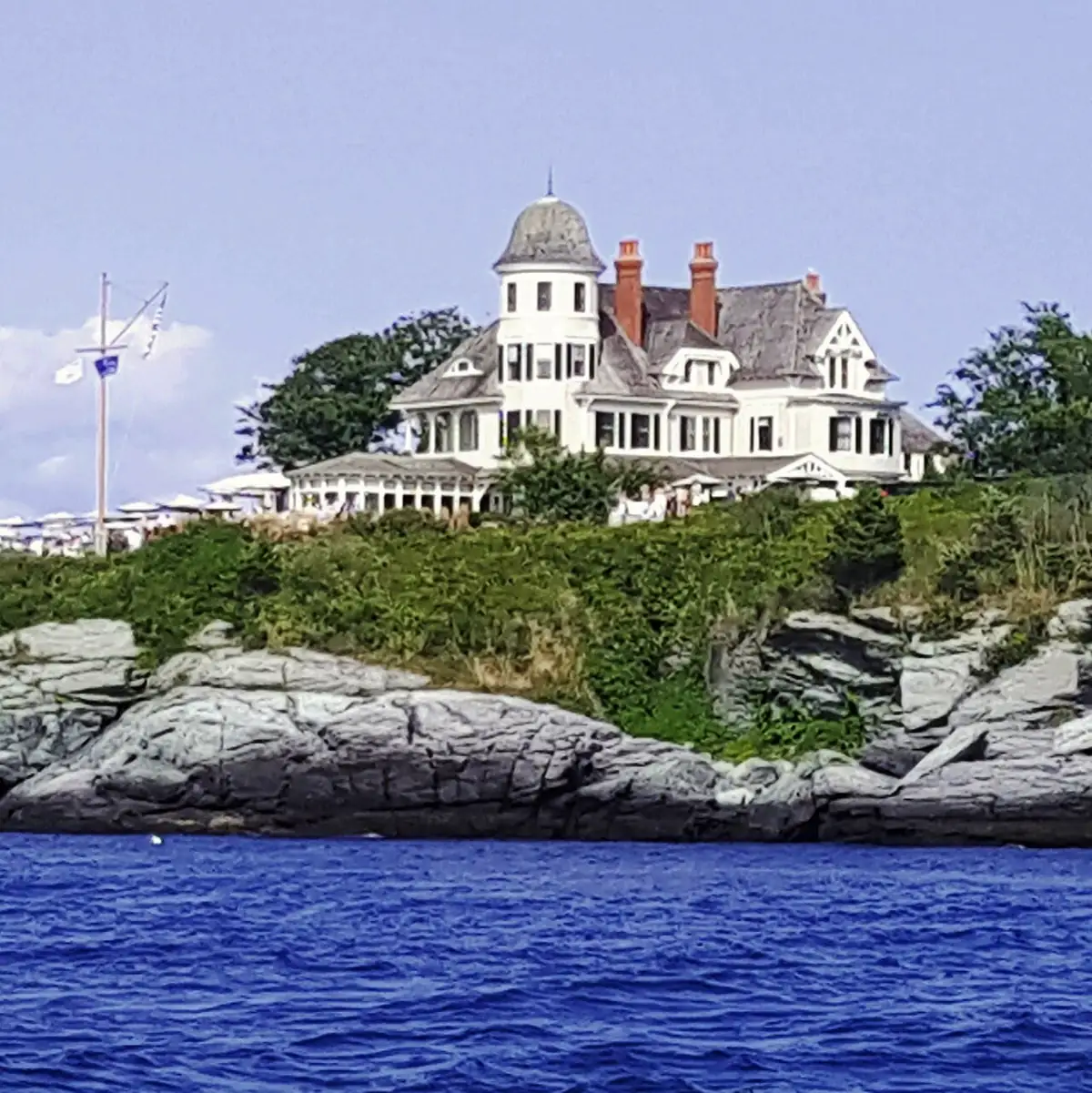 Castle Hill Inn's shingle-style house on a rocky point above Narragansett Bay