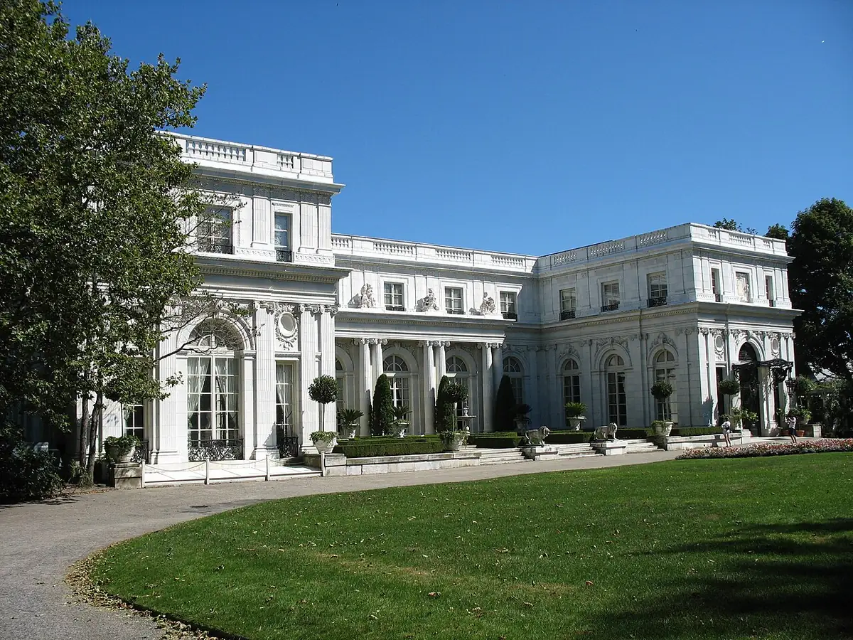 White terracotta facade of Rosecliff and its lawn in Newport
