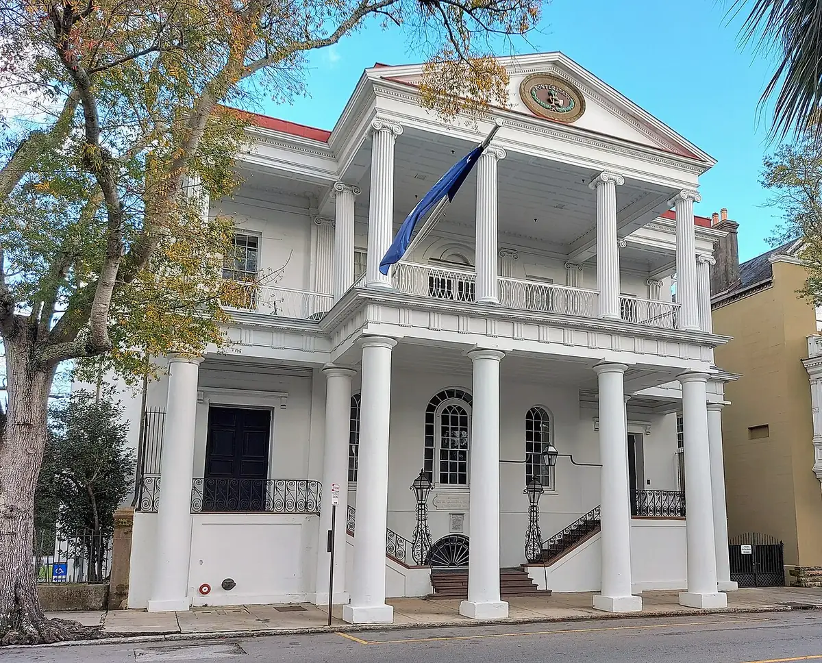 Two-story white portico of South Carolina Society Hall on Meeting Street, Charleston